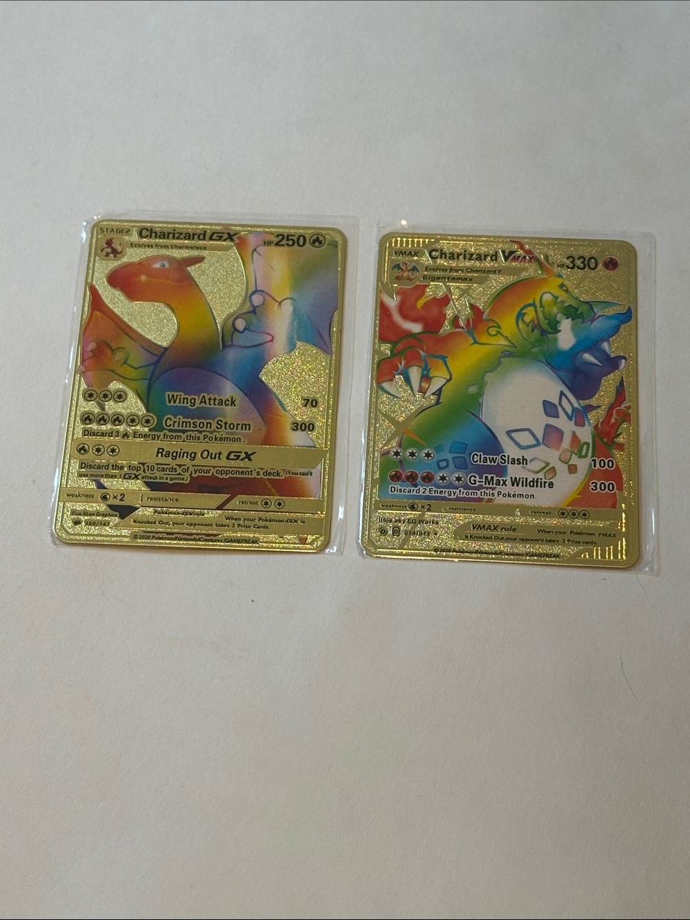 New in packaging Metal Charizard VMAX Pokémon Card + Charizard GX